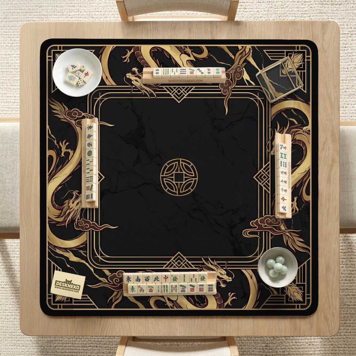 Black mahjong table mat with a gold dragon border, gold geometric corner details, and a clear center play area.