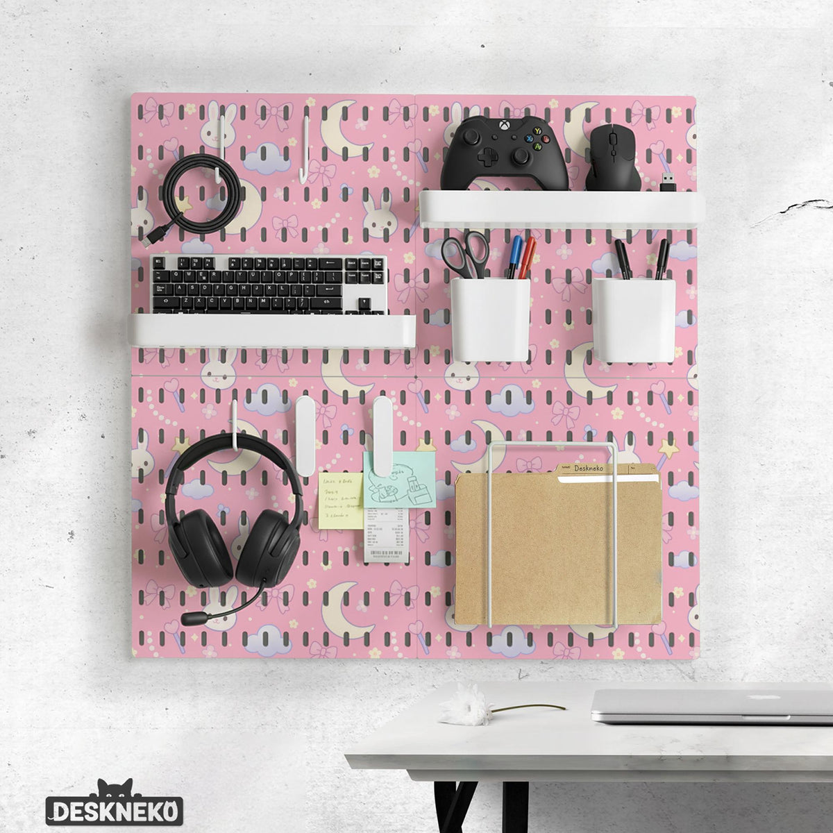 Pink pegboard panels with a kawaii bunny, cloud, moon, bow, and star pattern shown as a wall organizer set.