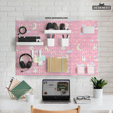 Pink pegboard panels with a kawaii bunny, cloud, moon, bow, and star pattern shown as a wall organizer set.