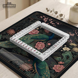 Square black mahjong mat with a gold peacock, blush flowers, and dark botanical artwork on a dark background.