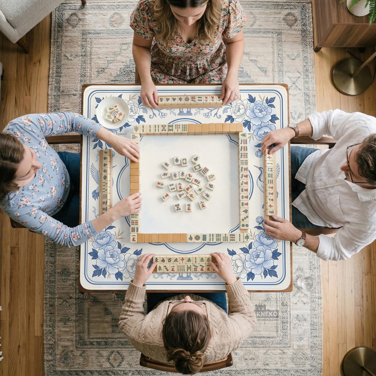 Square mahjong mat with a blue chinoiserie floral pattern on a light background.