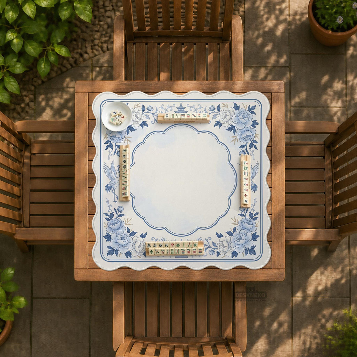 Square mahjong mat with a blue chinoiserie floral pattern on a light background.