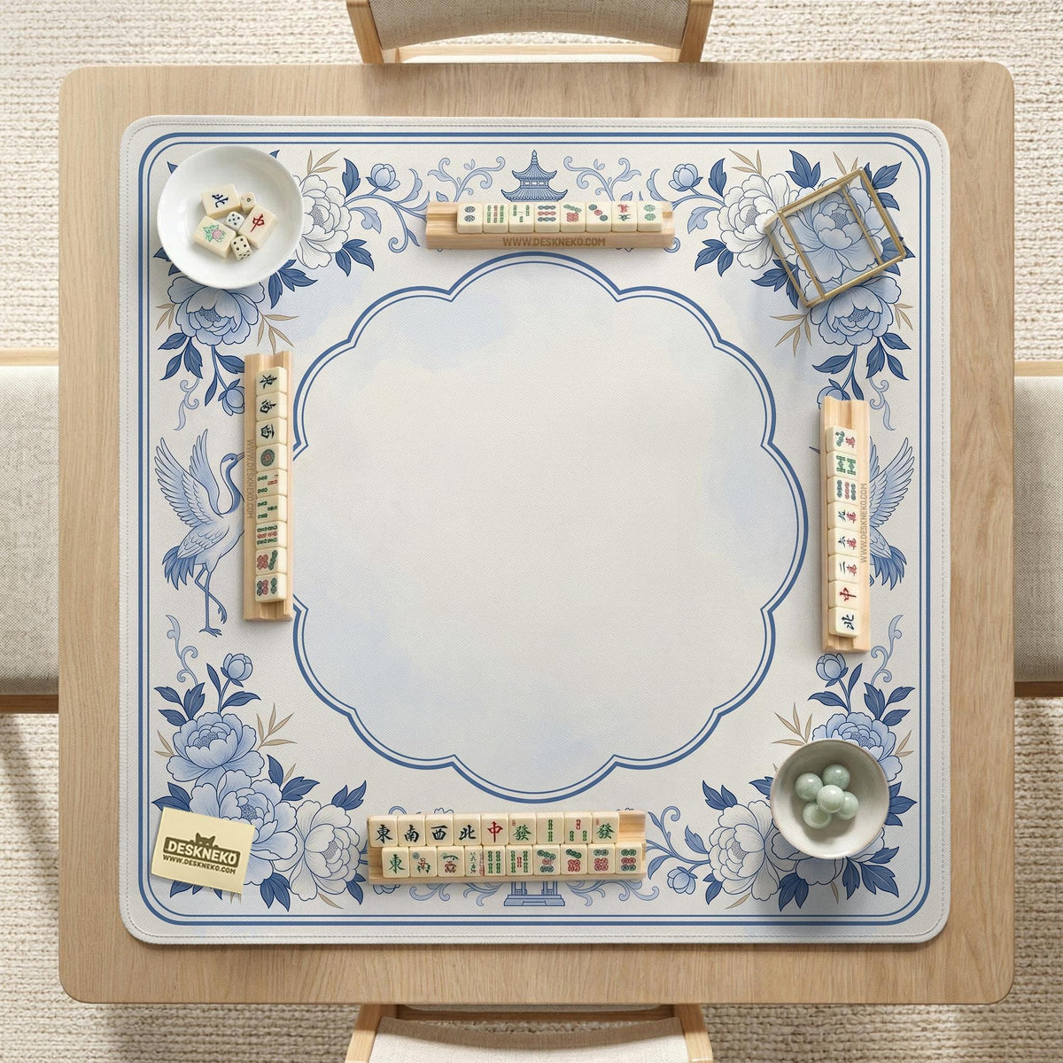 Square mahjong mat with a blue chinoiserie floral pattern on a light background.