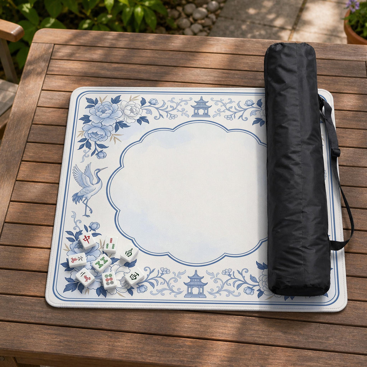 Square mahjong mat with a blue chinoiserie floral pattern on a light background.