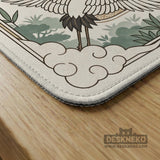 Square mahjong table mat with a cream center and a border design of cranes, bamboo, plum blossoms, and a geometric frame in sage green and warm gold.