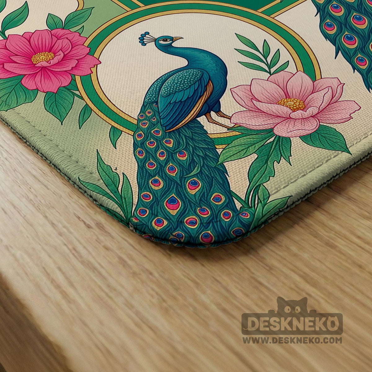 Green mahjong mat with peacocks, hibiscus flowers, tropical leaves, cream center space, and a scalloped floral border.