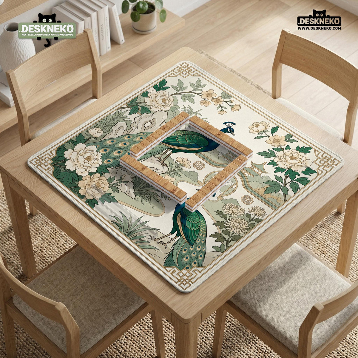 A green mahjong mat with peacock, floral, bamboo, pagoda, and gold border artwork in a scalloped chinoiserie style.