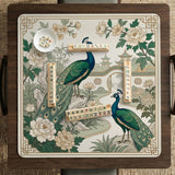 A green mahjong mat with peacock, floral, bamboo, pagoda, and gold border artwork in a scalloped chinoiserie style.