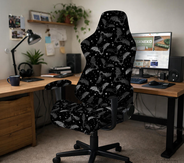 Black chair cover with a bat and star pattern shown on a gaming chair, with multiple cover style options listed for full chair, back and seat, seat only, and armrests.
