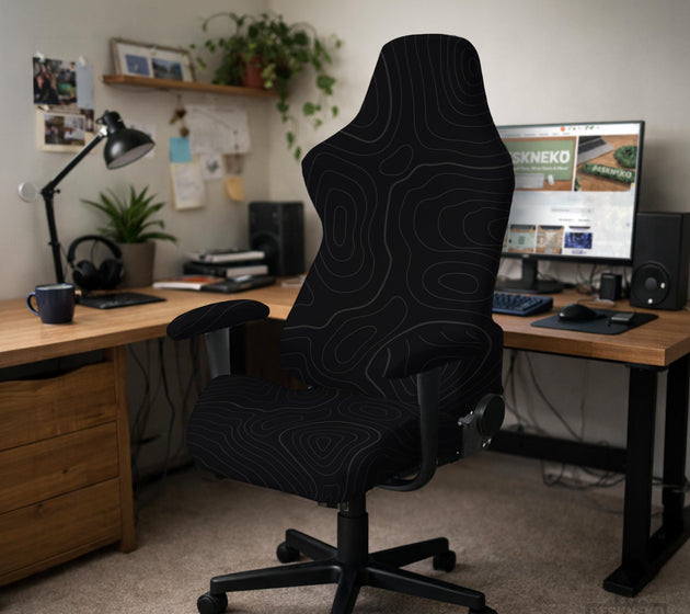 Black chair cover with a thin line art pattern on a gaming chair, shown with a high back and armrest areas covered.