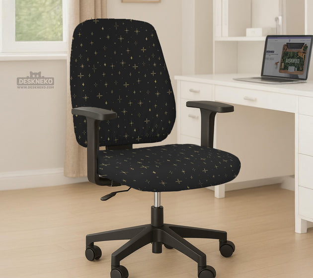 Desk chair cover in black with a small gold star pattern shown on a swivel chair.