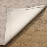 Beige door curtain with a crescent moon, leafy botanical branches, gray line art, and dotted celestial details.