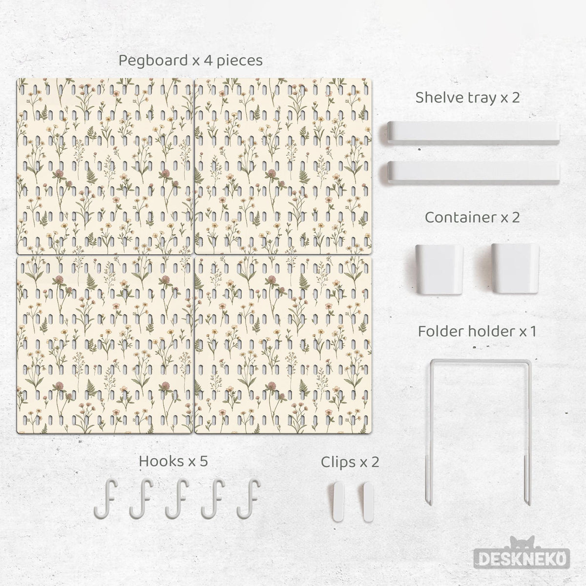 Cream pegboard wall organizer with small floral print, sage green stems, black slot layout, shelves, hooks, clips, and containers.