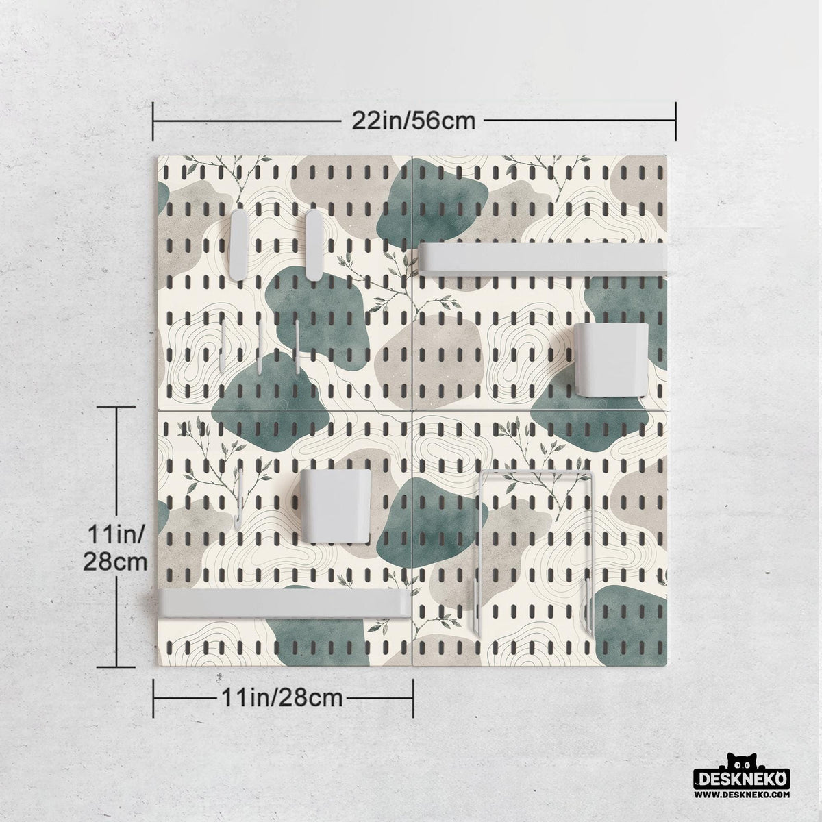 Four pegboard panels in sage green with cream, grey, teal, and leafy botanical artwork arranged in a square layout.