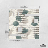 Four pegboard panels in sage green with cream, grey, teal, and leafy botanical artwork arranged in a square layout.