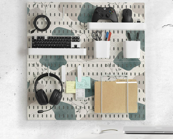 Four pegboard panels in sage green with cream, grey, teal, and leafy botanical artwork arranged in a square layout.