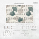 Four pegboard panels in sage green with cream, grey, teal, and leafy botanical artwork arranged in a square layout.