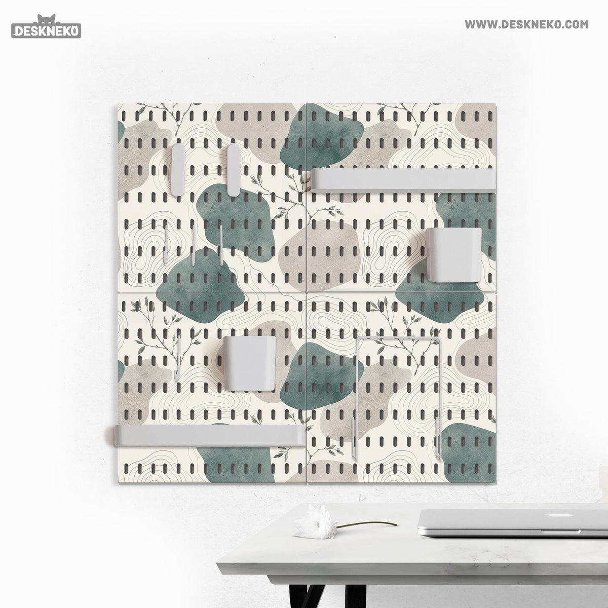 Four pegboard panels in sage green with cream, grey, teal, and leafy botanical artwork arranged in a square layout.
