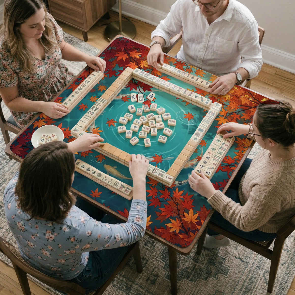 Square teal mahjong mat with koi fish, falling autumn leaves, and pond water artwork.