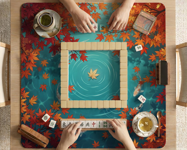 Square teal mahjong mat with koi fish, falling autumn leaves, and pond water artwork.