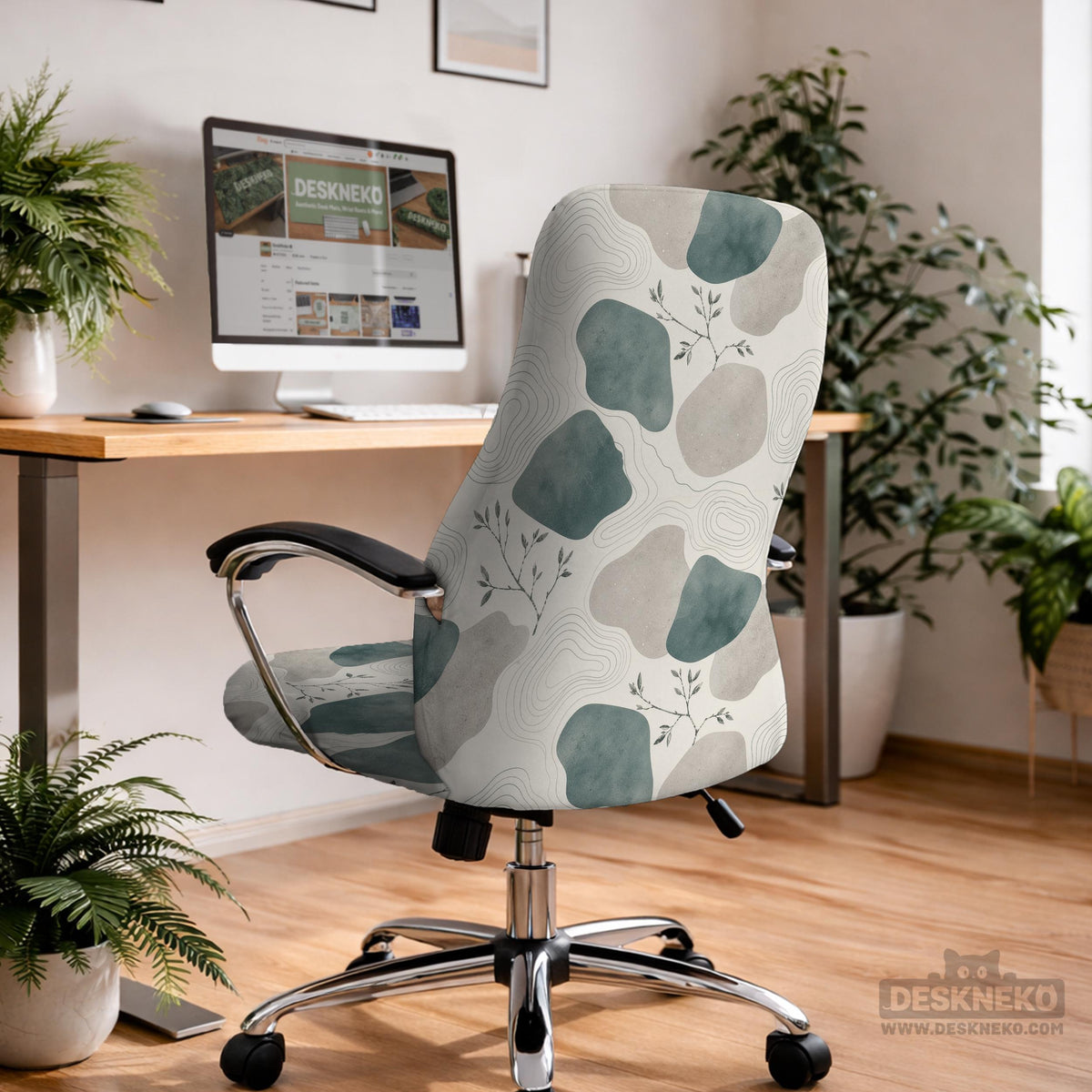 Chair cover with a cream background, muted sage abstract shapes, grey organic forms, and small botanical accents.