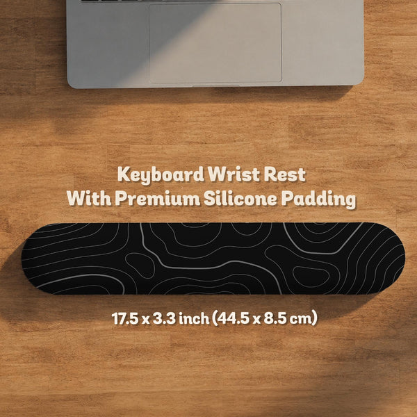 Black mousepad with a gray topographic contour line pattern shown with matching keyboard wrist rest options.
