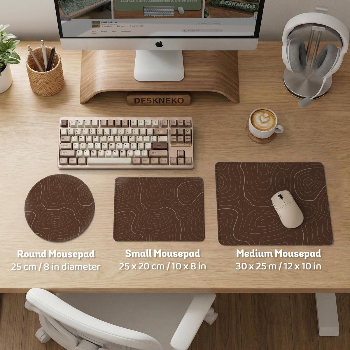 Brown desk mat with a repeating topographic contour line pattern in a neutral earth tone design.