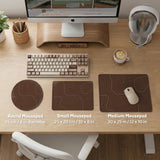 Brown desk mat with a repeating topographic contour line pattern in a neutral earth tone design.