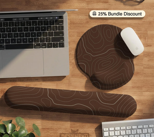 Brown mousepad and keyboard wrist rest with a topographic contour-line pattern.