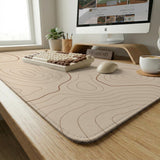 A beige mousepad with a topographic line pattern in a repeating design.