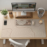 Beige desk mat with soft brown topographic contour lines on a neutral background.