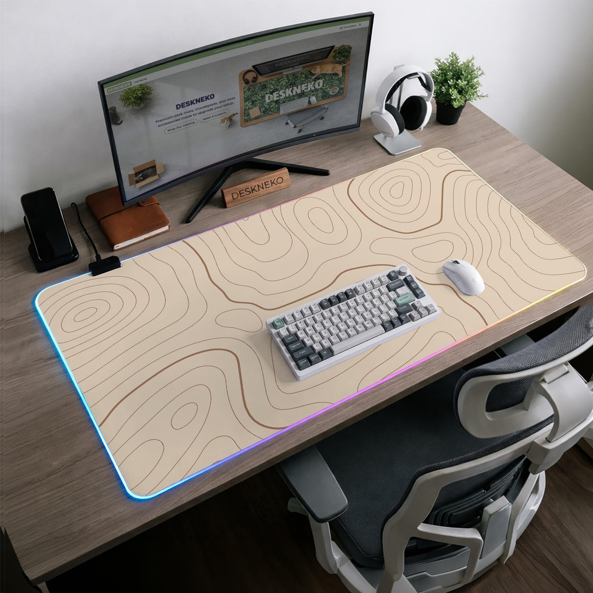 A beige mousepad with a topographic line pattern in a repeating design.