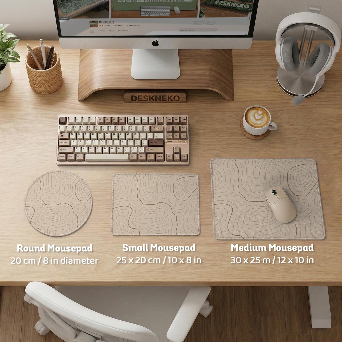 Beige desk mat with soft brown topographic contour lines on a neutral background.