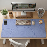 A pastel blue mousepad with an abstract topographic contour line pattern.