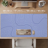 A pastel blue mousepad with an abstract topographic contour line pattern.