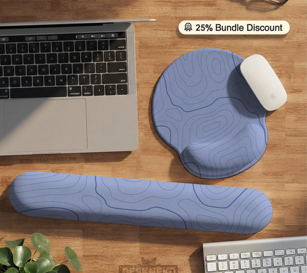 Periwinkle ergonomic mousepad and keyboard wrist rest with a light blue topographic contour line pattern.