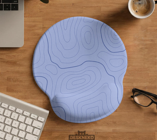 Periwinkle ergonomic mousepad and keyboard wrist rest with a light blue topographic contour line pattern.
