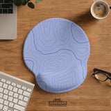 Periwinkle ergonomic mousepad and keyboard wrist rest with a light blue topographic contour line pattern.