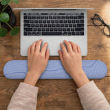 Periwinkle ergonomic mousepad and keyboard wrist rest with a light blue topographic contour line pattern.