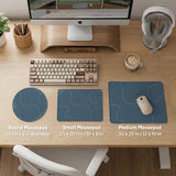 Blue mousepad with a topographic line pattern on a slate background.