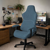 Slate gray chair cover with a blue gray topographic line pattern shown on a high back gaming chair.
