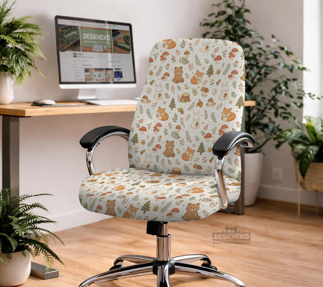 A gaming chair cover with a woodland animal print featuring foxes, rabbits, bears, mushrooms, and leaves in green, brown, and beige tones.