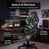 Green chair cover with a dark floral pattern, pink roses, cream flowers, and leafy botanical details on an office chair.