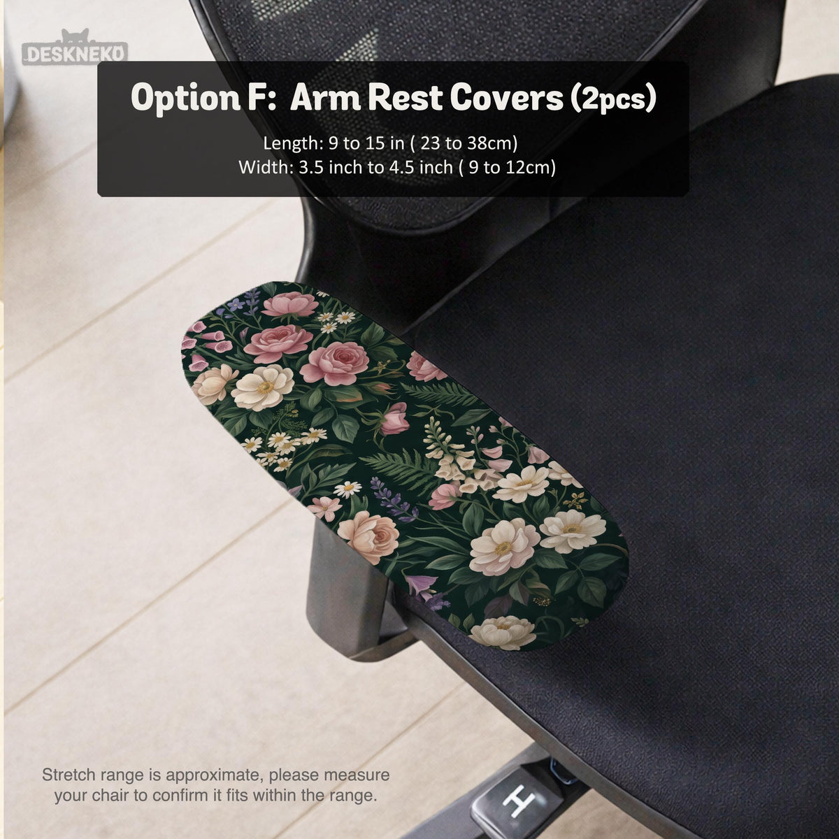 Green chair cover with a dark floral pattern, pink roses, cream flowers, and leafy botanical details on an office chair.