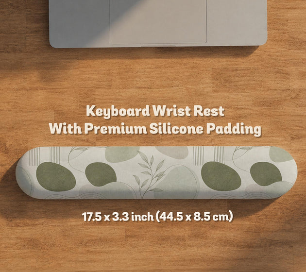 Green abstract botanical mouse pad with a rounded organic pattern and matching keyboard wrist rest option.