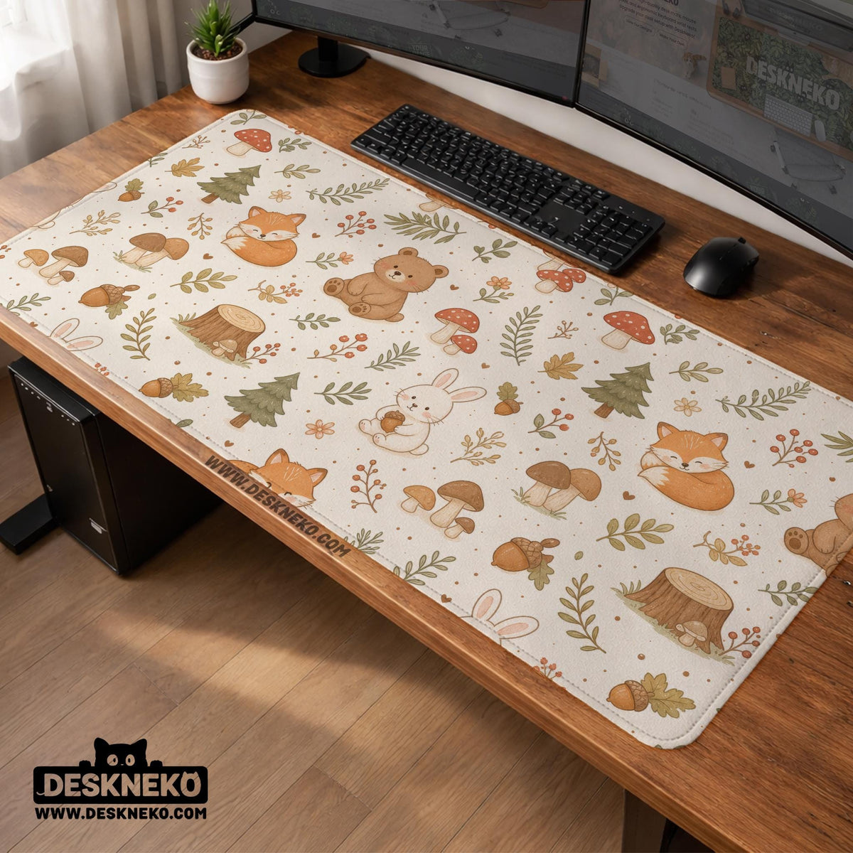Cream desk mat with a woodland animal pattern featuring foxes, bunnies, mushrooms, berries, acorns, and sage leaves in soft green tones.