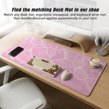 Soft pink mouse pad and wrist rest with a cloud-marble pattern, pale linework, and small star details.