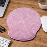 Soft pink mouse pad and wrist rest with a cloud-marble pattern, pale linework, and small star details.