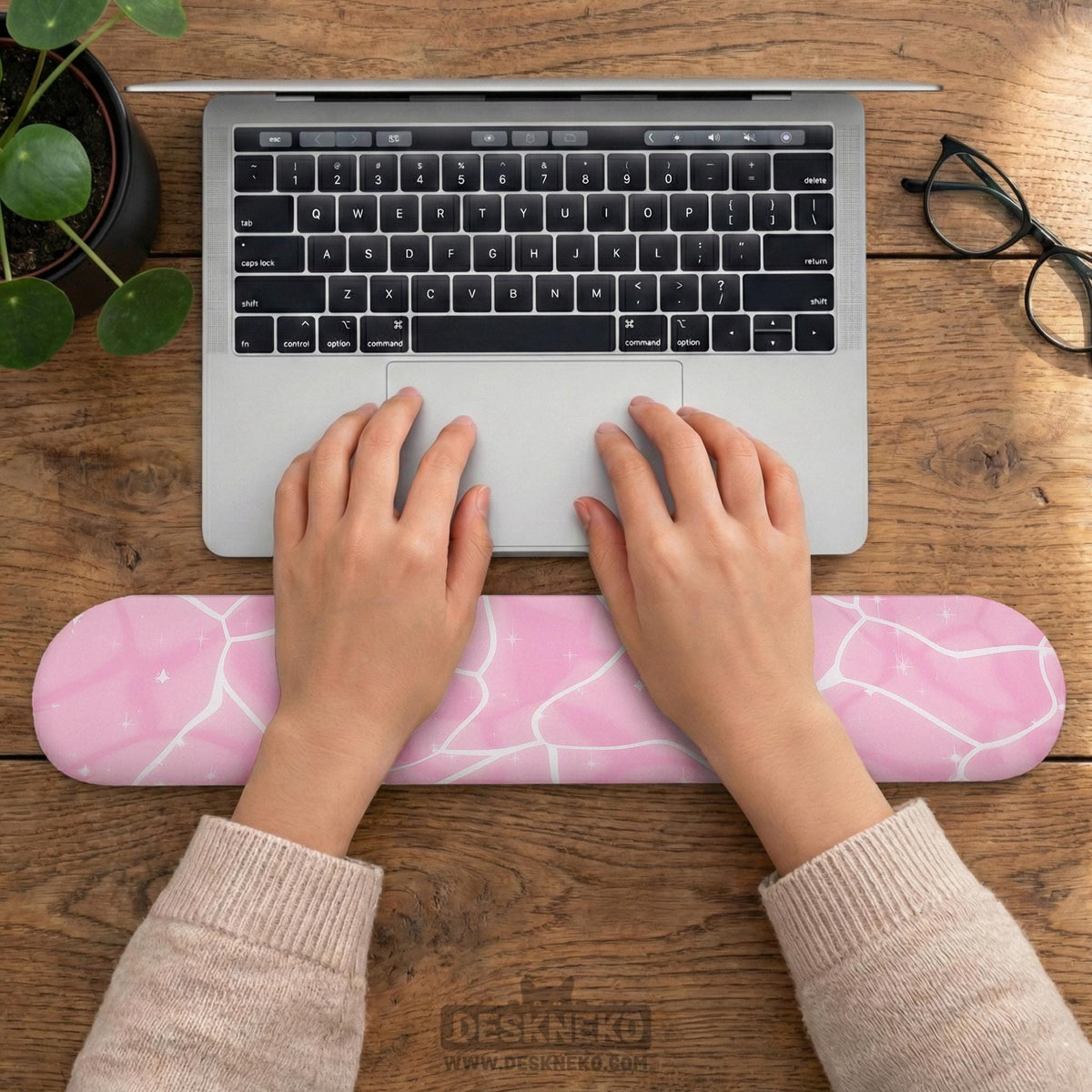 Soft pink mouse pad and wrist rest with a cloud-marble pattern, pale linework, and small star details.