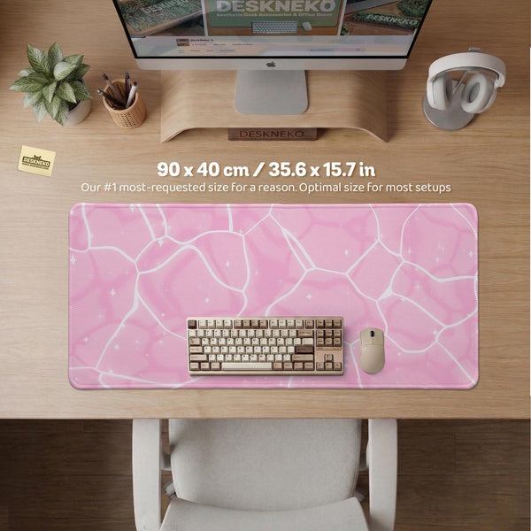 Soft pink desk mat with a kawaii cloud-marble pattern, white crackle lines, and small star accents.